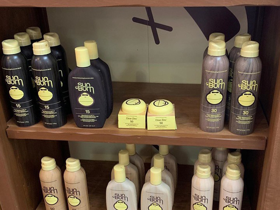 Sun tan lotion on display shelves
